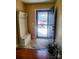 Inviting foyer features a coat rack with bench and a view of the landscaped front yard at 811 Wynnshire Dr # A, Hickory, NC 28601