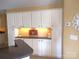 Detailed view of kitchen cabinets and countertops with recessed lighting at 811 Wynnshire Dr # A, Hickory, NC 28601
