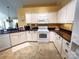 Kitchen showcases white cabinetry, countertops and modern appliances at 811 Wynnshire Dr # A, Hickory, NC 28601