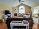 Spacious living room features a vaulted ceiling, fireplace, and hardwood floors at 811 Wynnshire Dr # A, Hickory, NC 28601