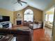Bright living room with vaulted ceiling, fireplace, and a comfortable seating area at 811 Wynnshire Dr # A, Hickory, NC 28601