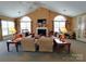 Spacious living room with a fireplace, comfortable seating, and large arched windows at 811 Wynnshire Dr # A, Hickory, NC 28601