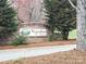 Stone community sign surrounded by lush landscaping in a tranquil setting at 811 Wynnshire Dr # A, Hickory, NC 28601