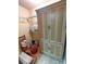 Spacious storage room with armoire, wire shelving, chair, and storage boxes at 811 Wynnshire Dr # A, Hickory, NC 28601