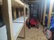 Unfinished storage featuring wooden shelving and a red wagon at 811 Wynnshire Dr # A, Hickory, NC 28601