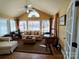 Bright sun room filled with natural light from large windows and cozy seating at 811 Wynnshire Dr # A, Hickory, NC 28601