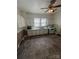Classic kitchen features white cabinetry, essential appliances, and durable flooring at 818 N 4Th St, Albemarle, NC 28001