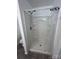 A walk-in shower featuring a clear curtain and neutral tone at 818 N 4Th St, Albemarle, NC 28001