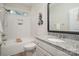 This bathroom has a bathtub and shower with granite countertops and a classic design at 8209 Bella Vista Ct, Charlotte, NC 28216