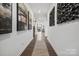 Bright hallway with hardwood floors and stylish artwork creates a welcoming entrance to this beautiful home at 825 Hallman Branch Ln, Lincolnton, NC 28092