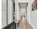 Bright foyer with hardwood floors, offering a warm welcome into the home at 8718 Festival Way, Charlotte, NC 28215