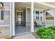 Welcoming front porch with a seating area, perfect for relaxing outdoors at 8718 Festival Way, Charlotte, NC 28215