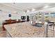 Kitchen island features granite countertop and sink in an open-concept floor plan at 8718 Festival Way, Charlotte, NC 28215
