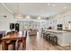 Spacious living area featuring a large island and comfortable seating at 8718 Festival Way, Charlotte, NC 28215