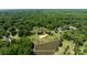 Aerial view of lot with pond, greenery, and approximate lot lines; survey recommended at 8805 Wingard Dr, Waxhaw, NC 28173