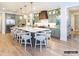 Spacious kitchen with a large center island with seating and custom cabinetry at 8805 Wingard Dr, Waxhaw, NC 28173