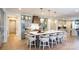 Spacious kitchen with a large island and seating, modern appliances, and open floor plan at 8805 Wingard Dr, Waxhaw, NC 28173