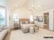 Bright main bedroom with vaulted ceilings and neutral decor at 8805 Wingard Dr, Waxhaw, NC 28173