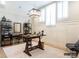 Home office features shuttered windows, hardwood flooring, and white walls at 8805 Wingard Dr, Waxhaw, NC 28173