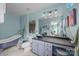 Stylish bathroom with a vessel sink, soaking tub, and modern fixtures at 10308 Garrett Grigg Rd, Charlotte, NC 28262