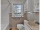Neutral bathroom featuring a shower-tub combination and built-in shelving at 106 Courtland St, Chester, SC 29706