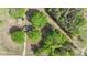 Aerial view of a home surrounded by lush trees and green spaces at 1099 S Potter Rd, Lancaster, SC 29720