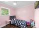 Small room with pink walls featuring a single bed with unicorn-themed sheets at 1099 S Potter Rd, Lancaster, SC 29720