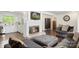 Bright living area with a fireplace, comfortable seating, and access to the kitchen at 1099 S Potter Rd, Lancaster, SC 29720