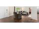 Cozy living room with ample natural light and hardwood flooring at 1099 S Potter Rd, Lancaster, SC 29720