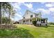 Charming two-story home with a sprawling front porch and screened in porch for relaxing outdoors at 1151 Trull Hinson Rd, Wingate, NC 28174