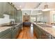 Gourmet kitchen has stainless appliances, granite countertops, and open access to living area at 1151 Trull Hinson Rd, Wingate, NC 28174