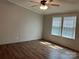 Spacious bedroom featuring two windows allowing ample natural light at 13079 Philadelphia Church Rd, Oakboro, NC 28129