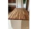 An oversized kitchen island has a butcher block top perfect for preparing meals and snacks at 13079 Philadelphia Church Rd, Oakboro, NC 28129