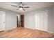 Bedroom featuring hardwood floors, closet and doorways to other rooms at 1478 Smith Farm Rd, Lincolnton, NC 28092