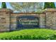 Stone entrance sign to the Courtyards of Huntersville, an Epcon Community at 14917 Dewpoint Pl, Huntersville, NC 28078