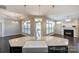 Bright open concept kitchen featuring stainless appliances and lots of natural light at 14917 Dewpoint Pl, Huntersville, NC 28078