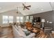 Large living room with vaulted ceilings, ceiling fans and lots of natural light at 14917 Dewpoint Pl, Huntersville, NC 28078