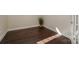 Cozy room with hardwood floors, natural light, and ample space, perfect as a den or office at 14917 Dewpoint Pl, Huntersville, NC 28078