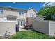 Spacious backyard with a patio dining set, grill, and well-maintained lawn, perfect for outdoor activities at 1518 Sylvia Ct, Charlotte, NC 28205