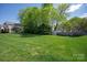 Large grassy backyard, perfect for outdoor activities and gatherings with ample space and a fence-line at 1518 Sylvia Ct, Charlotte, NC 28205