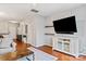 Open-concept living space with hardwood floors and lots of natural light at 1518 Sylvia Ct, Charlotte, NC 28205
