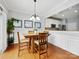 Dining area featuring wood floors and natural lighting at 15643 Canmore St, Charlotte, NC 28277