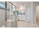 Bathroom with a walk-in shower, double sink vanity, and neutral color palette, offers a spa-like experience at 1996 Copper Path Dr, Fort Mill, SC 29715