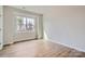Bedroom featuring wood floors and a large window, creating a bright and comfortable space to unwind and enjoy natural light at 1996 Copper Path Dr, Fort Mill, SC 29715