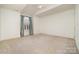 Spacious bedroom with vaulted ceilings, shuttered windows, and neutral decor at 20015 N Cove Rd, Cornelius, NC 28031