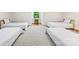 Spacious bedroom featuring four beds and hardwood floors at 210 Dexter Ave, Kannapolis, NC 28081