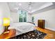 Bright bedroom with trey ceilings, large windows, and hardwood floors at 210 Dexter Ave, Kannapolis, NC 28081