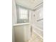 This bathroom features a shower and a modern white cabinet at 217 Windsor Dr, Shelby, NC 28150