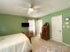 This spacious bedroom features great natural light and a unique antique desk at 217 Windsor Dr, Shelby, NC 28150