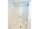 The shower features a built-in bench seat and sleek tiled walls at 217 Windsor Dr, Shelby, NC 28150